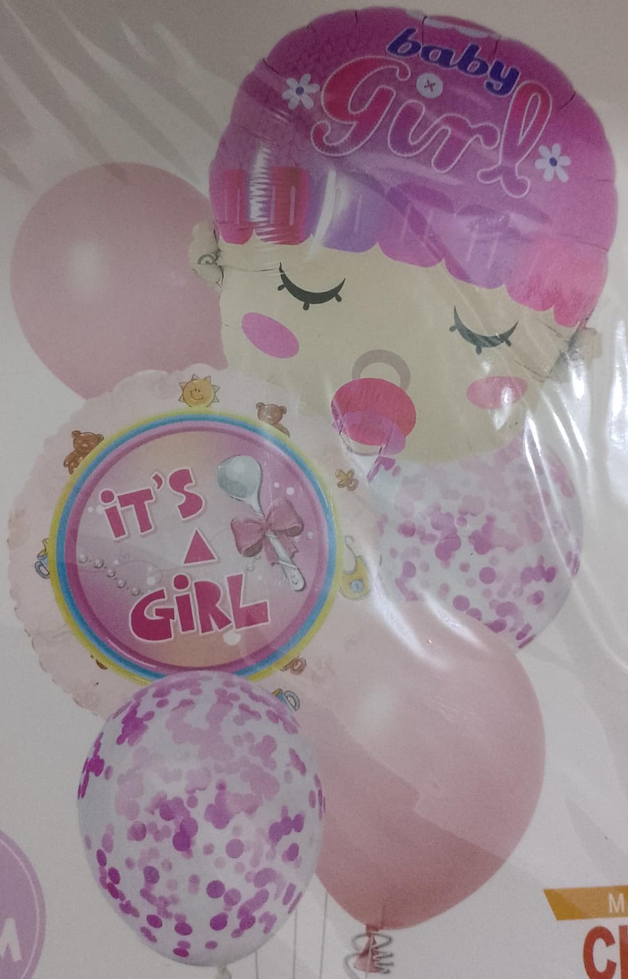 A set of baby shaped balloons for a baby girl’s Seboua party pink color